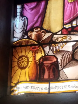 Vitrail Baie 19 : Saint-Antoine distribuant ses biens aux pauvres dans l'Église Saint-Ouen à Routot