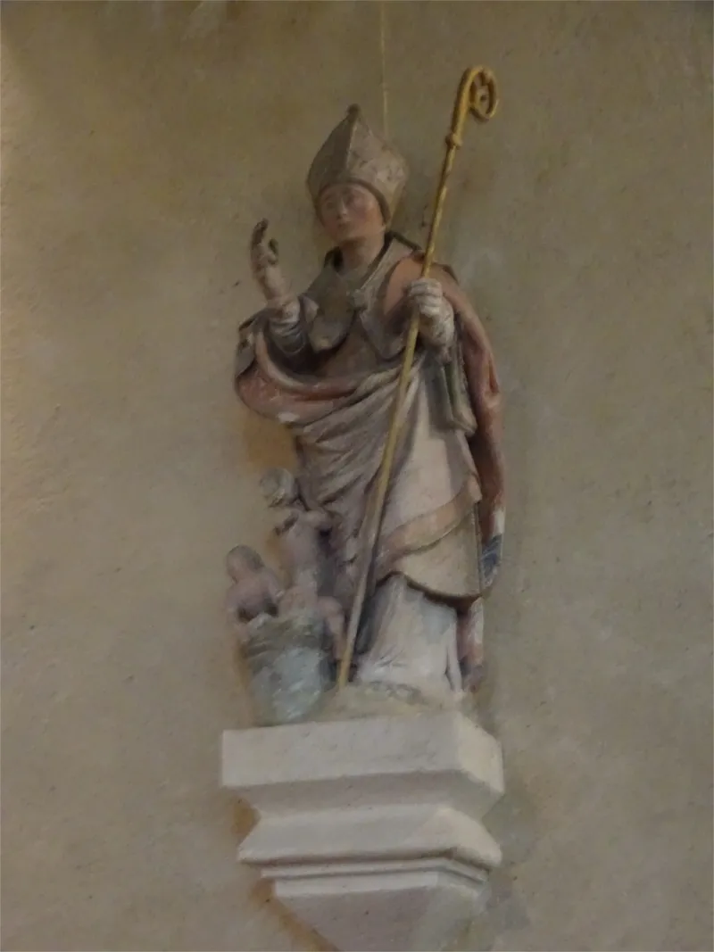 Groupe sculpté : Saint-Nicolas dans l'Église Saint-Quentin de Poses